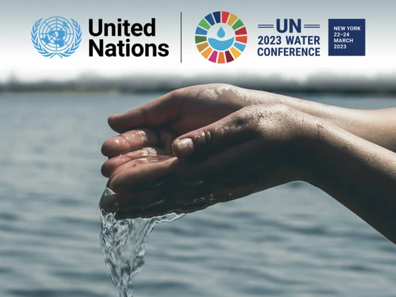 un logo and un water conference logo over a picture of hands holding water