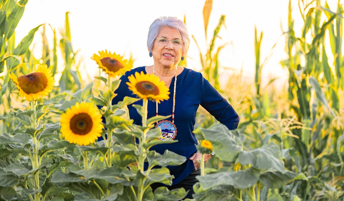chairwoman flores in a field of sunflowers