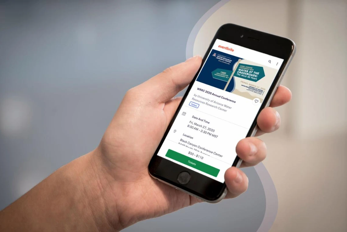 a handheld device displaying conference registration fee a handheld device displaying conference registration fee