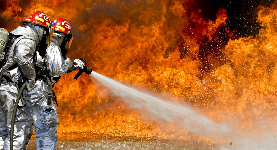 firefighter fight flames