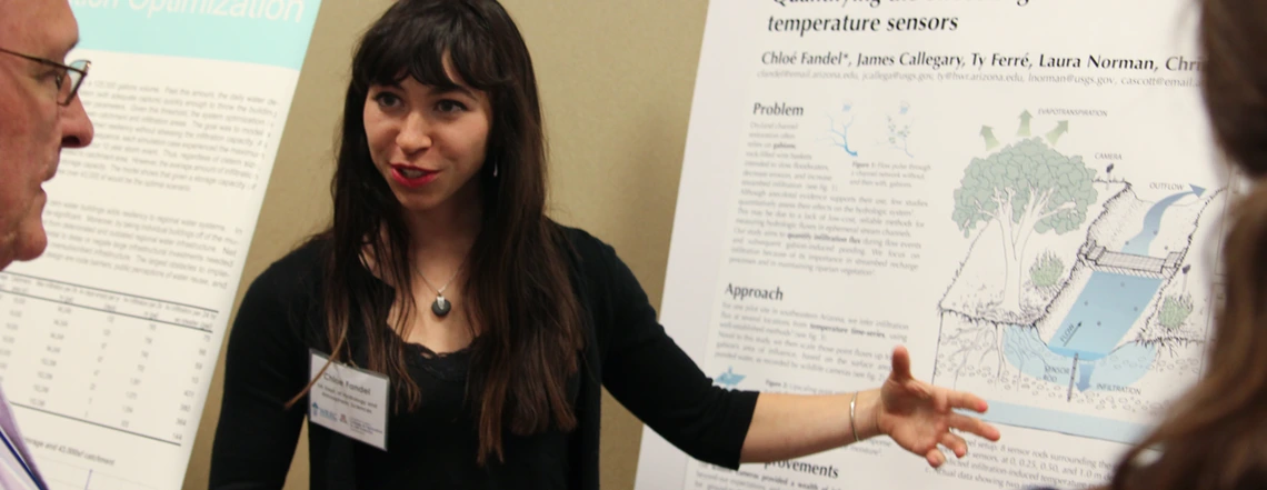Student Research Support Opportunity Student describing poster