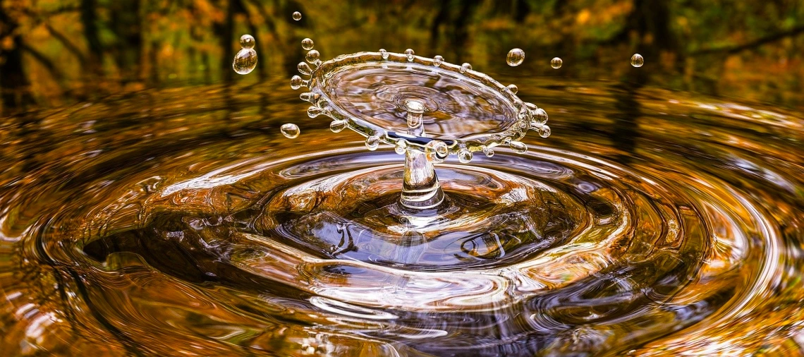 Water drop splash with ripples Water drop splash with ripples