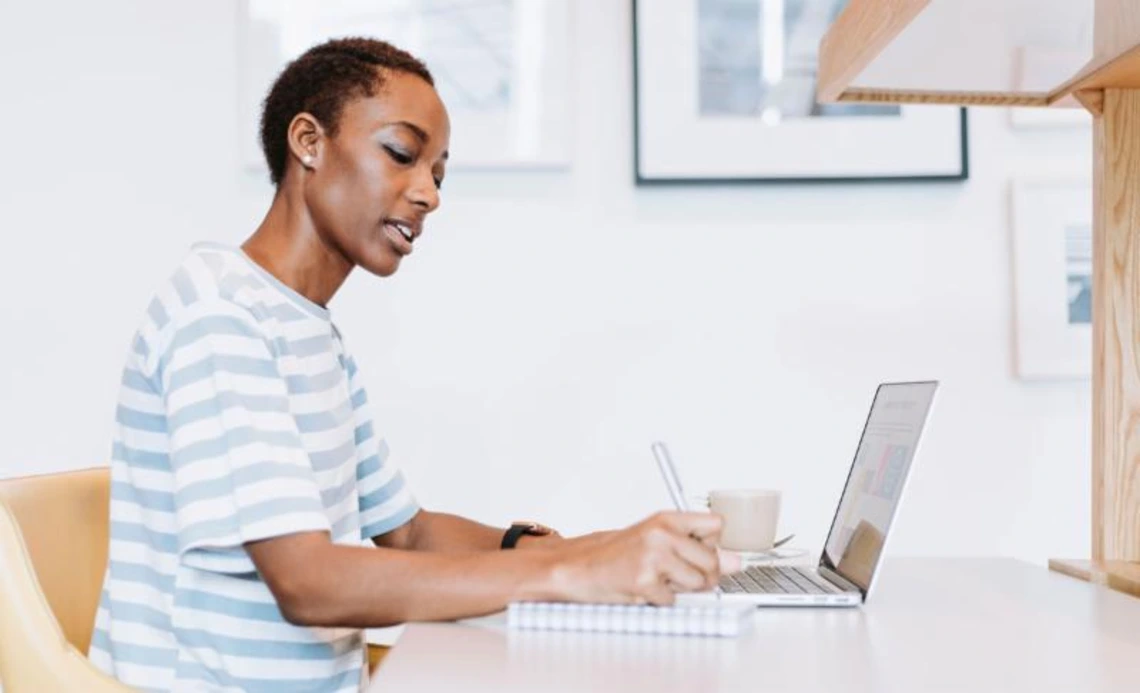 a woman typing a woman typing