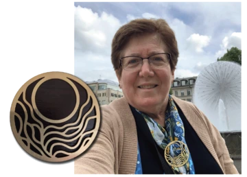 Water-themed clip worn by Women in Water Diplomacy Network members