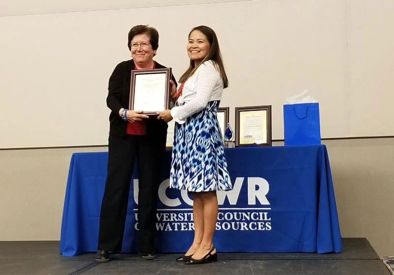Karletta Chief presenting an award to Sharon B. Megdal Karletta Chief presenting an award to Sharon B. Megdal